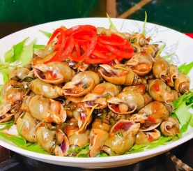 Ốc cà na xào me